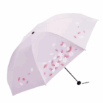 Parapluie pliant manuel lilas avec motifs floraux et feuilles roses, pratique et stylé pour les journées pluvieuses.