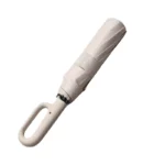 Parapluie tempête durable beige, design moderne et poignée ergonomique, idéal pour protection robuste contre vent et intempéries.