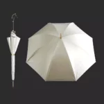 Parapluie homme luxe blanc ouvert avec poignée dorée, plié à côté sur fond noir, accessoire élégant et haut de gamme.