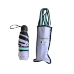 Parapluie de poche rayé noir et blanc avec étui happiness et sourire, accessoire pratique et trendy pour tous les jours.