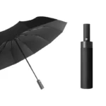 Parapluie anti retournement automatique noir, design élégant, ouvert avec son étui cylindrique noir, pratique et résistant.