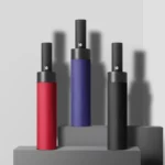 Parapluies anti-retournement automatiques en rouge, bleu et noir, alliant élégance et fonctionnalité, parfaits contre la pluie.