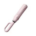 Parapluie rose compact anti-retournement, solide et élégant, avec poignée ergonomique, parfait pour un style chic sous la pluie.