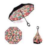 Parapluie inversé chic avec motif coloré de cercles rouge, vert et beige, élégant et pratique pour rester au sec par temps de pluie.