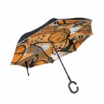 Parapluie inversé sport, design basketball orange et noir, motifs balle et panier, idéal pour fans de sport et pratique au quotidien.