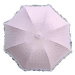 Parapluie mariage champêtre en dentelle rose élégante, design chic et romantique, idéal pour protéger de la pluie avec style.