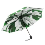 Parapluie original et coloré, design moderne avec motifs uniques, parfait pour une protection élégante contre la pluie.