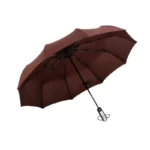 Parapluie tempête léger marron avec structure robuste et manche noir, parfait pour une protection optimale contre la pluie.