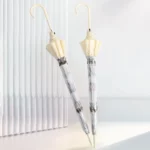 Parapluie transparent au motif chien ou chat, design élégant, idéal pour une protection stylée par tous les temps.