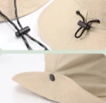 Chapeau de pluie beige pour femme, style bob, bord de 6 mm, avec cordon noir réglable et bouton sur la visière, collection [Collection].