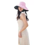 Chapeau de pluie femme large bord taille E 27, imperméable et anti-UV, élégant et pratique pour protéger contre la pluie et le soleil.