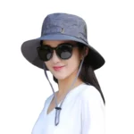Chapeau de pluie bob femme anti-UV gris, imperméable et élégant, parfait pour se protéger du soleil et des intempéries.