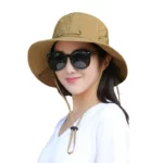 Chapeau de pluie bob femme beige anti-UV imperméable, parfait pour un style décontracté et une protection optimale en extérieur.