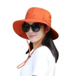 Chapeau de pluie bob femme orange anti-UV imperméable, idéal pour se protéger du soleil et de la pluie avec style et confort.