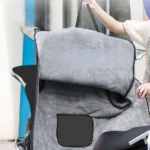 Tablier scooter avec manches, collection [Collection], protection grise imperméable pour conducteur, offre confort et praticité.