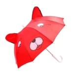 Parapluie enfant 3D rouge avec tête de chien et oreilles, parfait pour les journées pluvieuses et apporter un côté ludique.