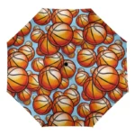 Parapluie enfant pliant avec motifs ballons de basketball, design coloré et pratique, idéal pour les jeunes passionnés de sport.