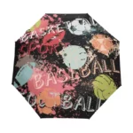 Parapluie enfant pliant motifs sport, basketball, baseball, football sur fond noir, pratique et coloré pour toutes les saisons.