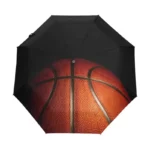 Parapluie enfant pliant design ballon de basketball, motif réaliste texture sport, accessoire pratique et tendance pour petits fans.