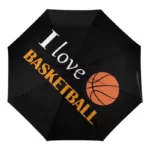 Parapluie enfant pliant noir avec texte I love BASKETBALL et motif ballon, idéal pour fans de basket. Compact et pratique.
