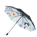 Parapluie enfant manuel avec motifs colorés de chats drôles et étoiles, parfait pour une protection amusante sous la pluie.