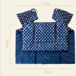 Tablier scooter à pois blancs, imperméable et élégant, parfait pour protection contre la pluie et confort en scooter.