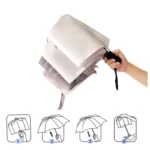 Parapluie automatique beige orangé avec pois et ondulations design, compact et facile à ouvrir, parfait pour rester élégant sous la pluie.