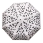 Parapluie beige de luxe automatique avec poignée tête d'ours, élégant et pratique, parfait pour un style raffiné par tous les temps.