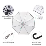 Parapluie chien transparent liseré noir avec laisse intégrée, structure robuste et poignée ergonomique pour balades élégantes.