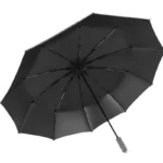 Parapluie tempête grand format noir, robuste et spacieux, idéal pour une protection efficace contre la pluie intense.