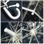 Parapluie transparent léger orné d'étoiles, crochet blanc, structure interne visible, élégant et pratique pour les jours de pluie.