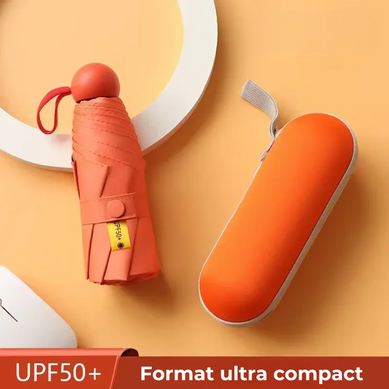 Parapluie orange compact avec étui assorti, manuel, léger et protecteur UV (UPF50+), idéal pour toutes saisons et voyage.