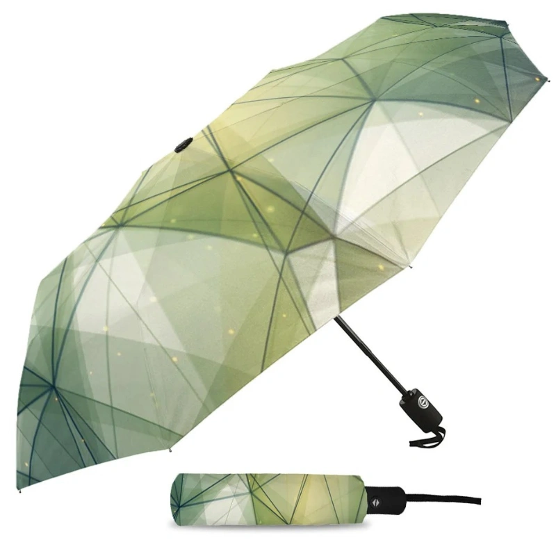 Parapluie automatique design triangles verts, compact et stylé, ouvert avec housse assortie, parfait pour un usage quotidien.