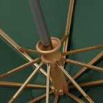 Parapluie automatique doré, éléguant et robuste, de la collection [Collection] avec détails dorés et toile verte raffinée.