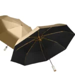 Parapluie automatique doré élégant et raffiné, qualité premium, parfait pour obtenir style et protection contre la pluie.
