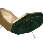 Parapluies automatiques doré et vert foncé de qualité, élégants, issus de la collection premium Paraluieo pour vos journées pluvieuses.