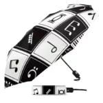 Parapluie automatique noir et blanc motif musical élégant avec notes de musique, pratique et stylé pour tous les amateurs de musique.
