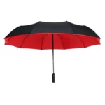Parapluie automatique rouge et noir luxe, pliant et élégant, parfait pour résister à la pluie avec style et praticité.