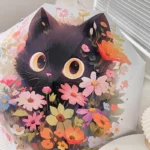 Parapluie automatique beige avec motif tête de chat noir et fleurs colorées, accessoire stylé et pratique pour la pluie.