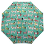 Parapluie manuel motifs chiens, accessoire ludique et coloré pour jours de pluie, parfait pour les amoureux des animaux.
