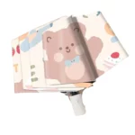 Parapluie enfant automatique ourson, coloré et ludique, motif d'ours mignon avec couleurs pastel, parfait pour affronter la pluie.