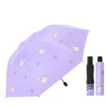 Parapluie enfant violet motifs lapins, ouverture automatique, anti-UV, compact avec étui assorti. Protection pluie et soleil stylée.