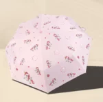 Parapluie automatique fille rose avec motifs licornes et cœurs, parfait pour protéger de la pluie avec style et fantaisie.