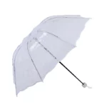 Parapluie manuel motif cœur blanc translucide, élégant et pratique, idéal pour femme et mariage, accessoire chic et raffiné.