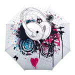 Parapluie manuel avec motif artistique de casques audio et éclaboussures colorées, parfait pour les amateurs de musique et de style.