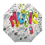 Parapluie manuel avec motifs musicaux colorés : notes, guitares, appareils audio et inscriptions comme 'MUSIC' et 'SOUND'.