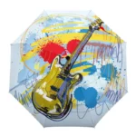 Parapluie manuel design musical avec illustration colorée d'une guitare sur fond bleu, rouge et jaune, alliant art et praticité.