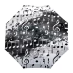 Parapluie manuel élégant avec motifs de notes de musique noires sur fond blanc, parfait pour allier créativité et style sous la pluie.