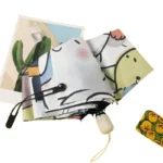 Parapluie marron beige motifs chatons, accessoire tendance, design ludique, idéal pour apporter style et protection par temps de pluie.