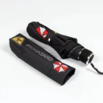 Parapluie marron vintage, élégant et stylé, avec motifs uniques et housse assortie. Accessoire parfait pour la pluie.